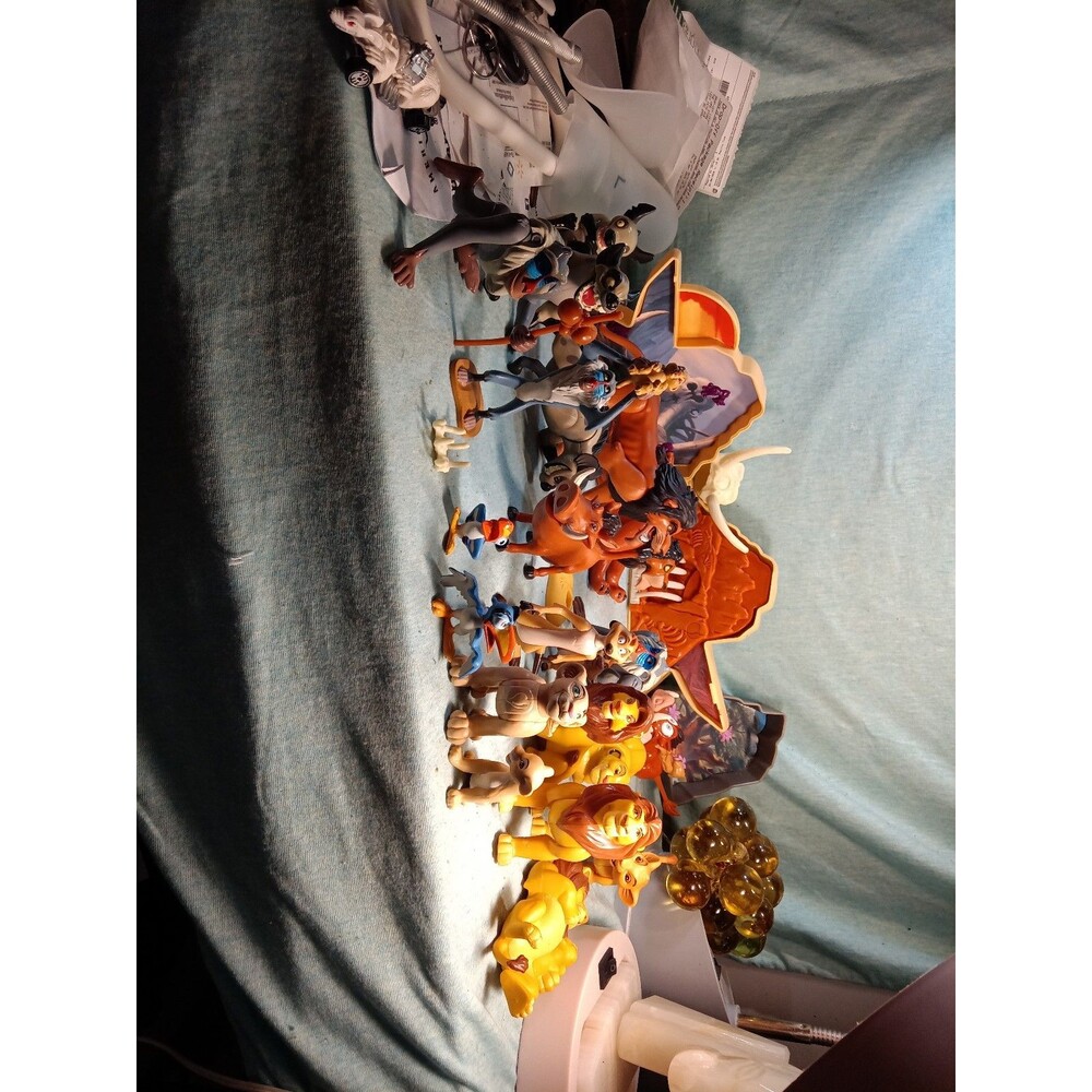 Vintage lot of Lion King figures 25